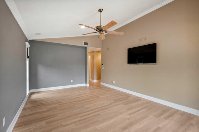 interior space featuring ceiling fan, ornamental molding, light hardwood / wood-style floors, and lofted ceiling