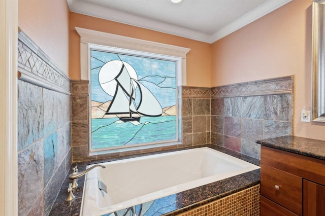 bathroom with tiled bath, vanity, and ornamental molding