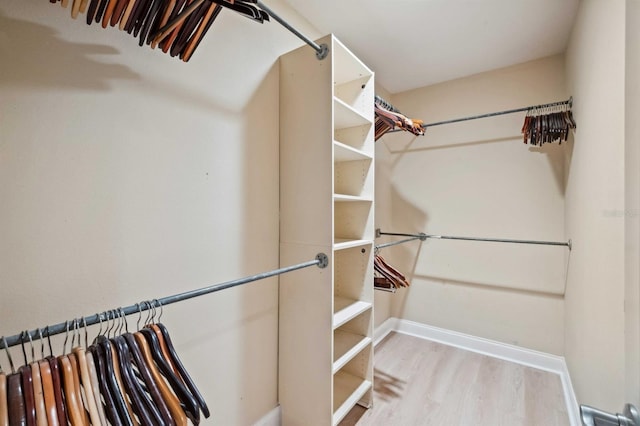 walk in closet featuring light wood-type flooring