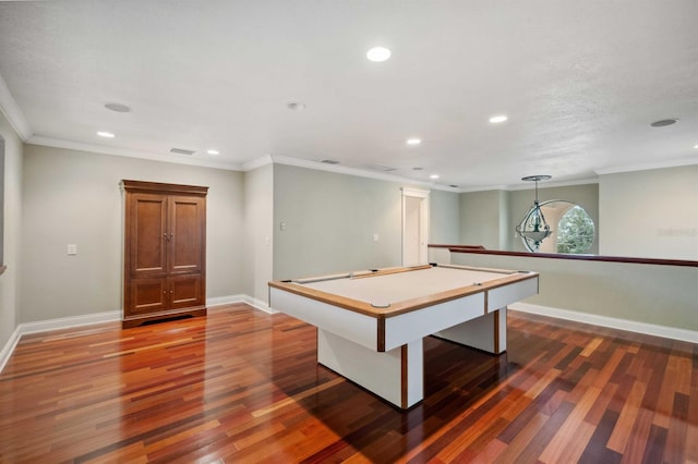 game room featuring crown molding, pool table, and dark hardwood / wood-style floors