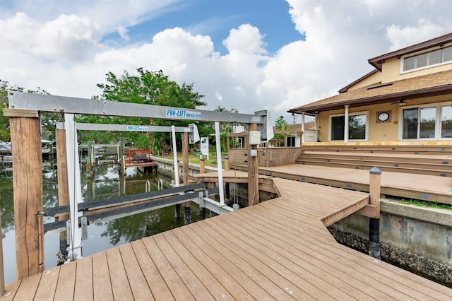 dock area featuring a water view