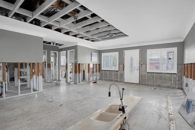 interior space featuring sink and a wealth of natural light