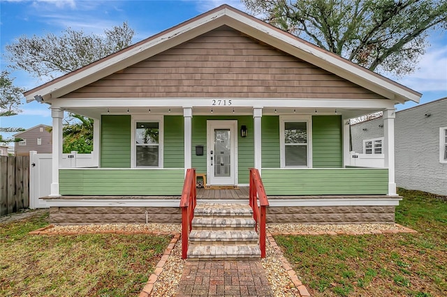 bungalow-style home with a porch