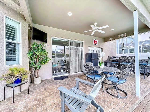 view of patio / terrace with ceiling fan