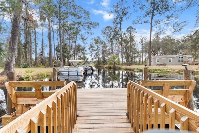 view of dock featuring a water view