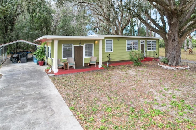 view of front facade featuring a carport