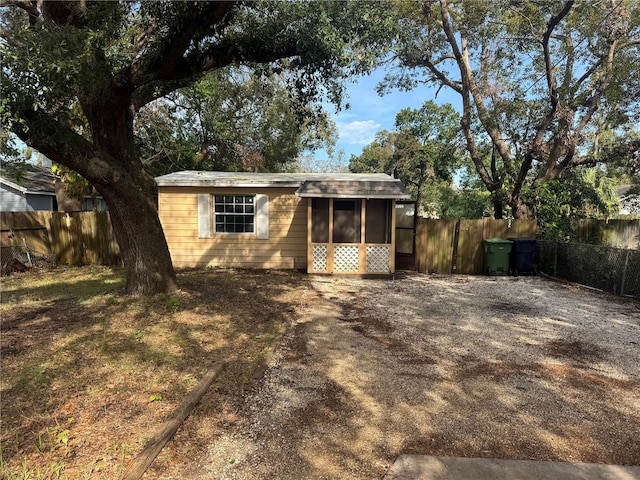 view of outbuilding with a fenced backyard