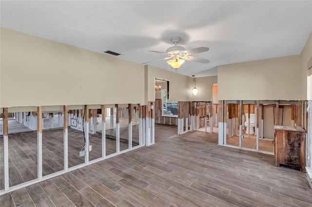 empty room featuring hardwood / wood-style flooring and ceiling fan