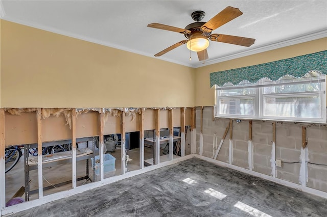 interior space featuring ornamental molding and ceiling fan