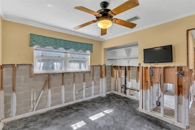 interior space with crown molding and ceiling fan