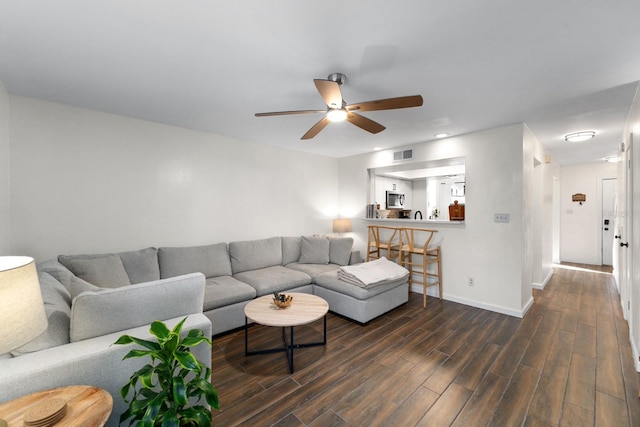 living room with ceiling fan