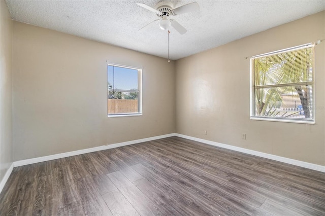 5130 Dr Martin Luther King Jr St S, Saint Petersburg, FL 33705 - spare room with ceiling fan, baseboards, a textured ceiling, and wood finished floors