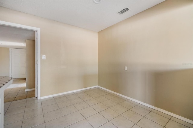 5130 Dr Martin Luther King Jr St S, Saint Petersburg, FL 33705 - unfurnished room featuring visible vents, baseboards, and light tile patterned flooring