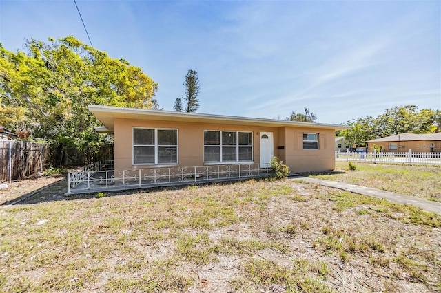 5130 Dr Martin Luther King Jr St S, Saint Petersburg, FL 33705 - single story home featuring stucco siding and fence