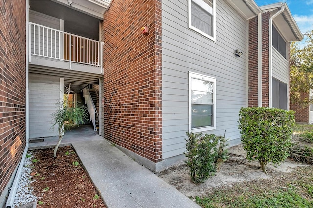 view of property exterior featuring a balcony