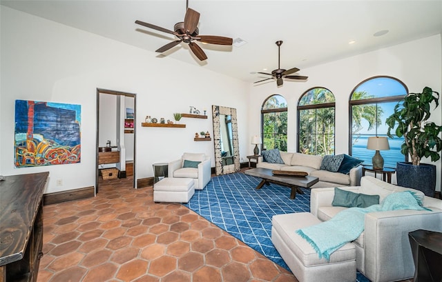 living area with ceiling fan, recessed lighting, visible vents, and baseboards