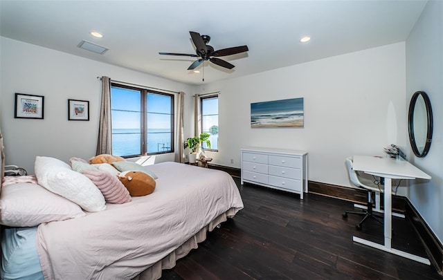 bedroom featuring recessed lighting, dark wood-type flooring, a ceiling fan, visible vents, and baseboards