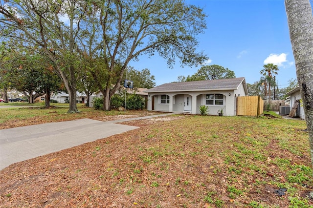 ranch-style house with a front yard