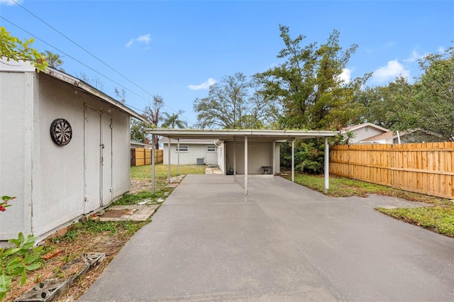 exterior space featuring a carport