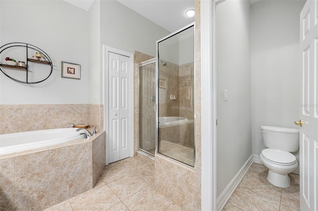 bathroom featuring plus walk in shower, toilet, and tile patterned floors