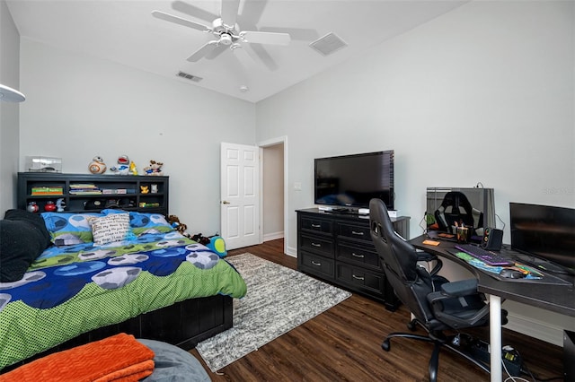 bedroom featuring ceiling fan and dark hardwood / wood-style floors