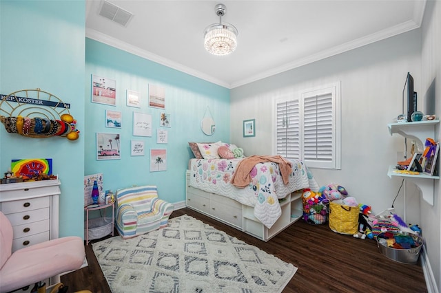 bedroom featuring crown molding and dark wood-type flooring