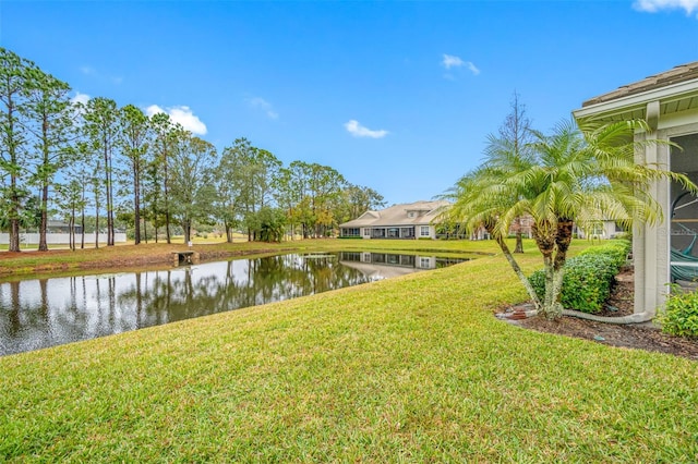 view of yard with a water view