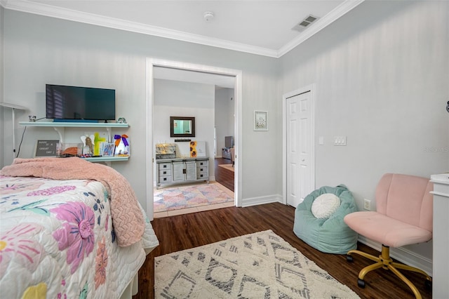 bedroom featuring dark wood-type flooring and ornamental molding