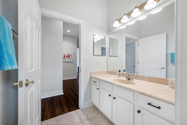 bathroom with vanity and tile patterned flooring