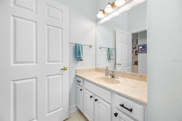 bathroom featuring vanity and tile patterned flooring