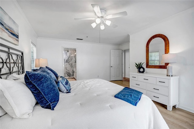 bedroom with multiple windows, ornamental molding, and light wood-type flooring