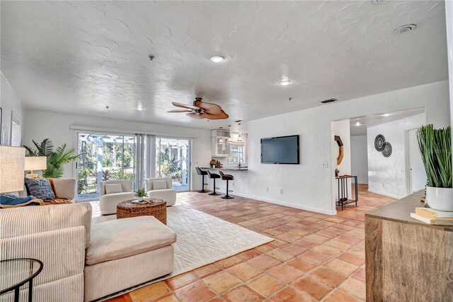 11624 Monette Rd, Riverview, FL 33569 - living area featuring ceiling fan and baseboards