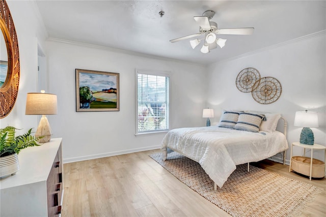 11624 Monette Rd, Riverview, FL 33569 - bedroom featuring light wood finished floors, crown molding, baseboards, and a ceiling fan