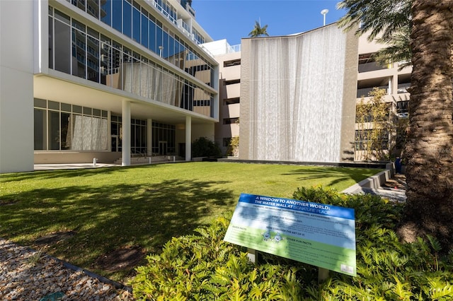 surrounding community featuring a lawn