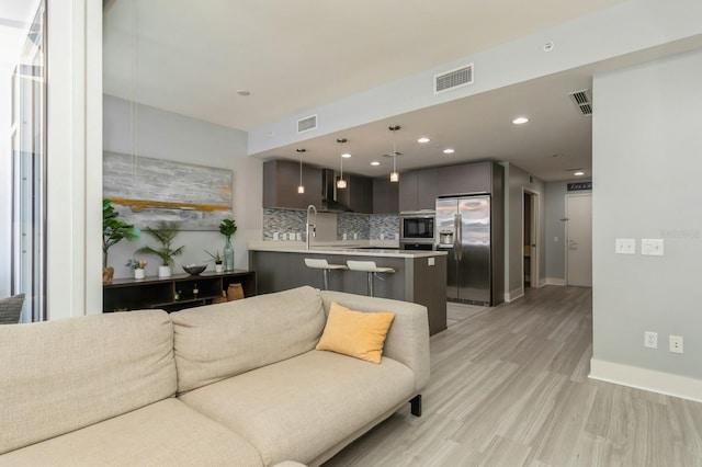 living room featuring light hardwood / wood-style floors