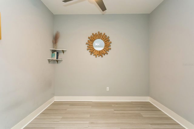 unfurnished room featuring ceiling fan and light hardwood / wood-style flooring