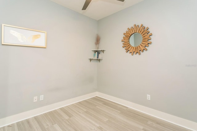 spare room with ceiling fan and light hardwood / wood-style flooring