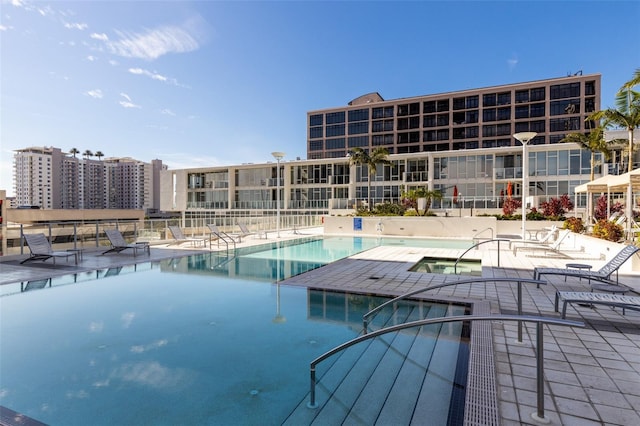 view of swimming pool with a patio