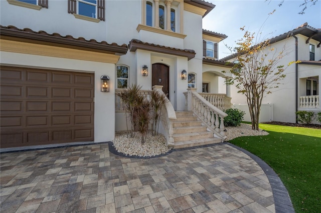 view of front of home with a garage and a front yard