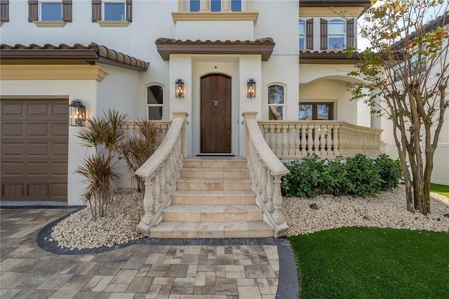 property entrance with a garage