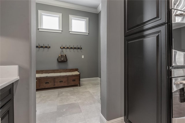 bathroom featuring vanity and crown molding