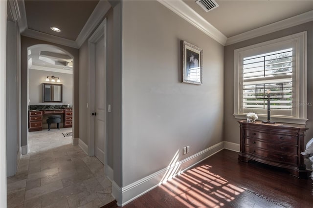 corridor featuring ornamental molding