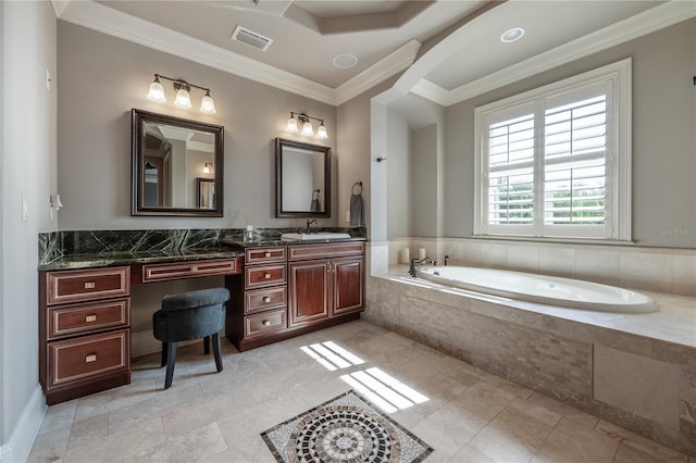 bathroom featuring ornamental molding, a relaxing tiled tub, and vanity