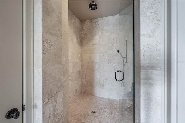 bathroom featuring an enclosed shower