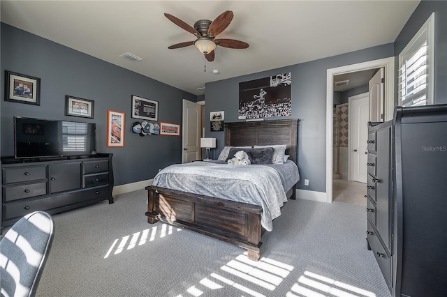 carpeted bedroom with ceiling fan