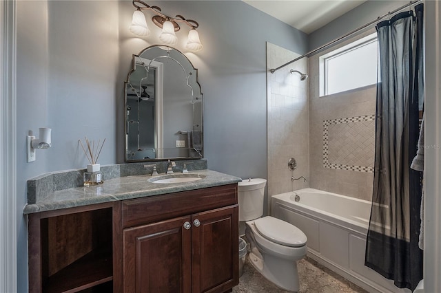 full bathroom featuring toilet, vanity, and shower / tub combo