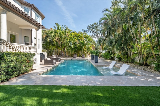 view of pool featuring a patio