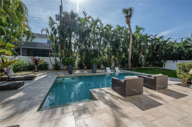 view of swimming pool featuring a patio area and outdoor lounge area