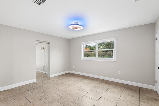 view of tiled spare room