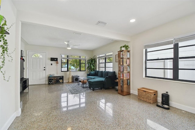 living room with ceiling fan